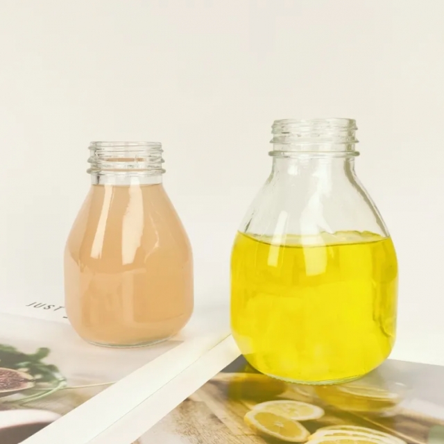 ขวดแก้ว ทรงกลม ขวดสำหรับใส่นม น้ำผลไม้ น้ำเปล่า ชานม ขนาด 300/500 ml พิมพ์โลโก้กำหนดเอง