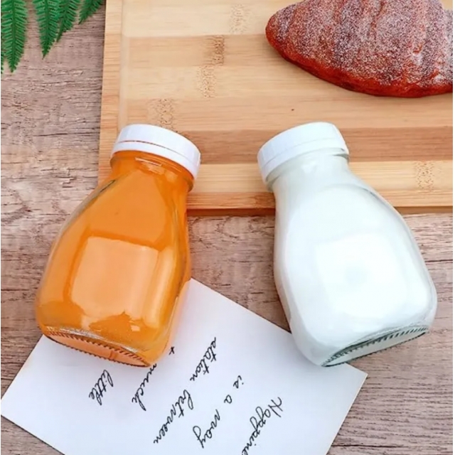 ขวดแก้วทรงกลม พร้อมฝาเกลียวล็อคพลาสติกสีขาว ขวดสำหรับใส่เครื่องดื่ม ขนาด 300/500 ml