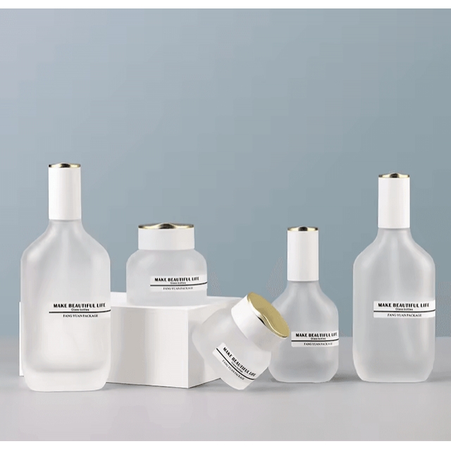 ชุดขวดแก้วเครื่องสำอาง แบบแบน 40 ml/100 ml/120 ml และกระปุกตลับครีม 30ml/50ml สีขาวทอง